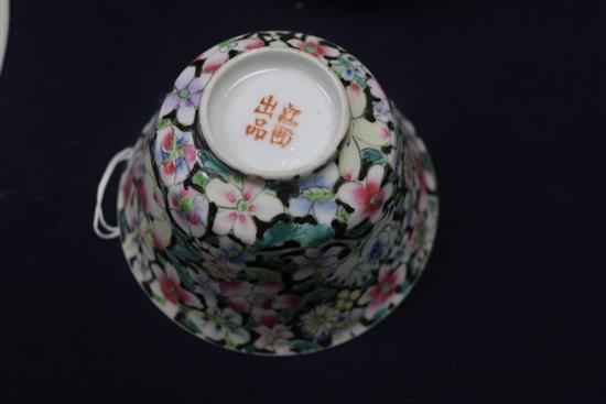 A Chinese ruby ground famille rose dish, early 20th century and a rice bowl, cover and stand